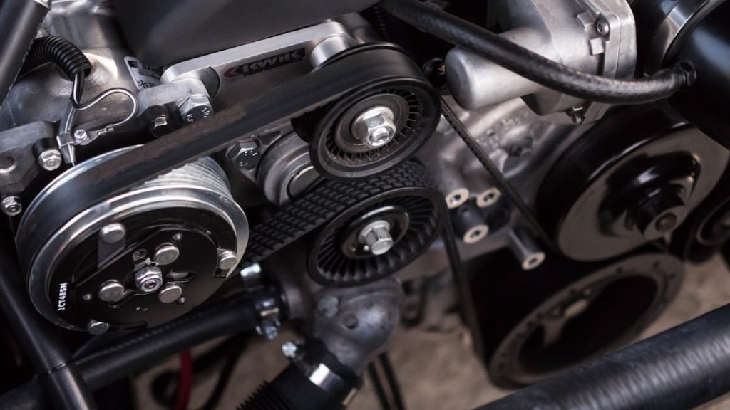 Mechanic MOT retest under bonnet