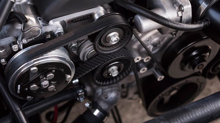 Mechanic MOT retest under bonnet