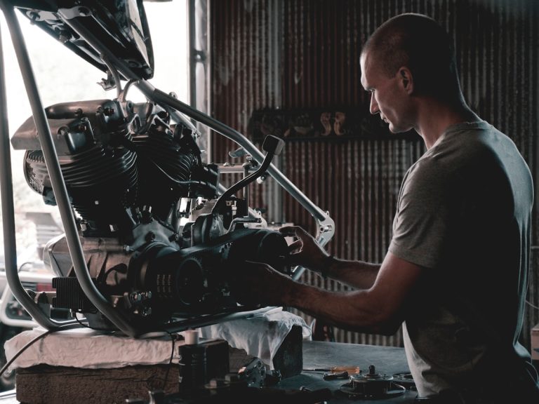 Workshop mechanic brake disc inspection