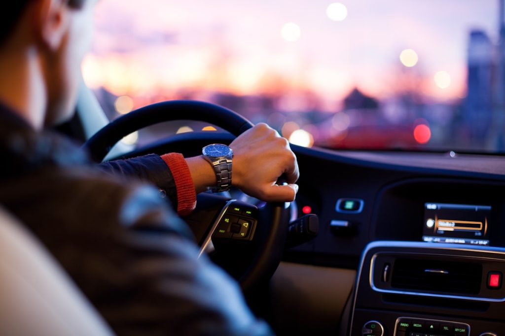 Car driving on road - valid MOT is required by UK law